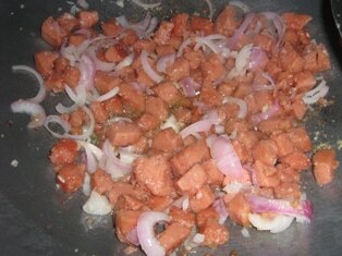 When meat is firm, add onion and garlic, another variation.
