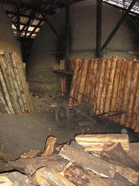 Drying out logs at Charcoal Factory in Taiping