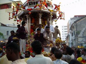 Devtoees getting blessed with each stop during Thaipusam Penang