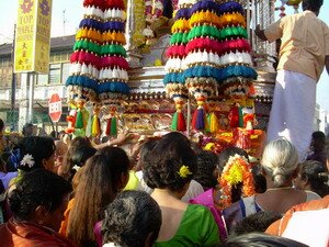 Devotees pushing the chariot during Thaipusam Penang Devotees pushing the chariot during Thaipusam Penang