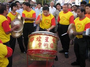 Cool master drumming during chap goh meh in penang Cool master drumming during chap goh meh in penang
