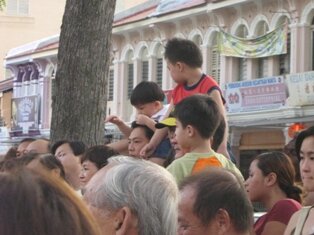 Drumming dad head during chap goh meh in penang