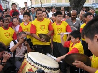Young drummers wooing the crowd during chap goh meh in penang Young drummers wooing the crowd during chap goh meh in penang