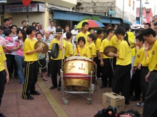 Girl drummer during chap goh meh in penang Girl drummer during chap goh meh in penang