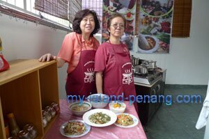 Chan eating in Penang Homecooks