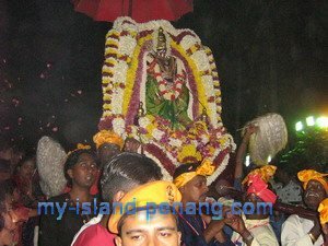 Sri Singamuga Kaliamman statue carried for sea chariot procession in Penang