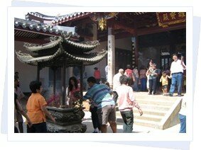 Praying in Chinese Temple Praying in Chinese Temple