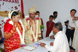 Taking the Marriage Vows in the presense of the Registrar Taking the Marriage Vows in the presense of the Registrar