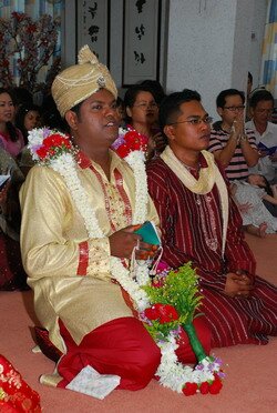 The Groom reciting the Buddhist Prayers The Groom reciting the Buddhist Prayers