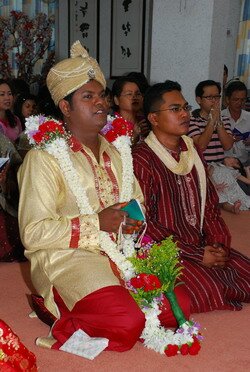 The Groom reciting the Buddhist Prayers