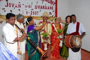 Mums blessing the newly weds in Hindu Wedding