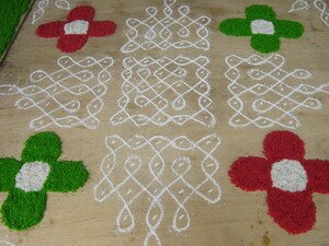 Rice flour kolam making in Mak Mandin Penang Rice flour kolam making in Mak Mandin Penang