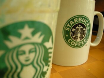 Enjoy a cup of Starbucks coffee Enjoy a cup of Starbucks coffee