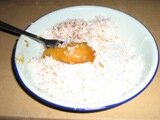 Grated coconut with toasted peanuts and sesame seed