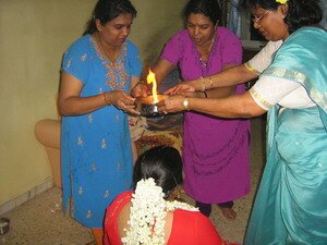Warding off Evil Influences at Malaysian Puberty Ceremony Warding off Evil Influences at Malaysian Puberty Ceremony