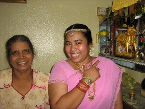 Prays to home altar at coming of age rituals Prays to home altar at coming of age rituals