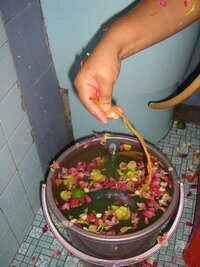 Turmeric and Flower Bath during Indian Malaysian Puberty Ceremony Turmeric and Flower Bath during Indian Malaysian Puberty Ceremony