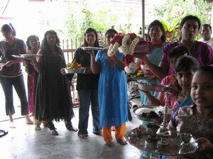 Relatives bearing gifts at the Malaysian Puberty Ceremony