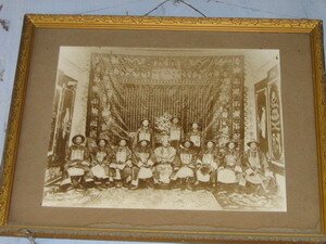 Matriarch Khaw Bee Gek with children in Kee Ancestral Hall