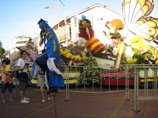 Man on stilts in Khoo Kongsi Penang Man on stilts in Khoo Kongsi Penang