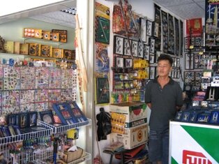 Mr Sim in Penang Snake Temple souvenir shop Mr Sim in Penang Snake Temple souvenir shop