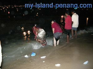 Sending off the lighted styrofoam lantern in Teluk Bahang Penang Sending off the lighted styrofoam lantern in Teluk Bahang Penang