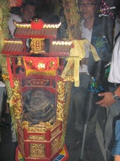 Tua Pek Kong seated on his Yin and Yang stool Tua Pek Kong seated on his Yin and Yang stool