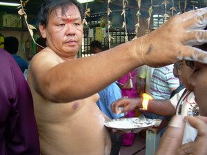 chinese mediums blessing the devotee during thaipusam penang chinese mediums blessing the devotee during thaipusam penang