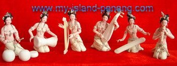 dough figurine maidens playing musical instrument