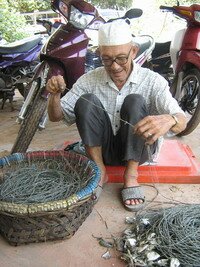 Preparing net in Kuala Muda Whispering Fish Auction