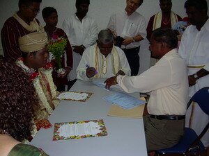 Registrar of Marriage solemizing Uva and Jivan marriage
