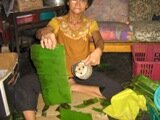 Use softened banana leaves to line the basket or tins